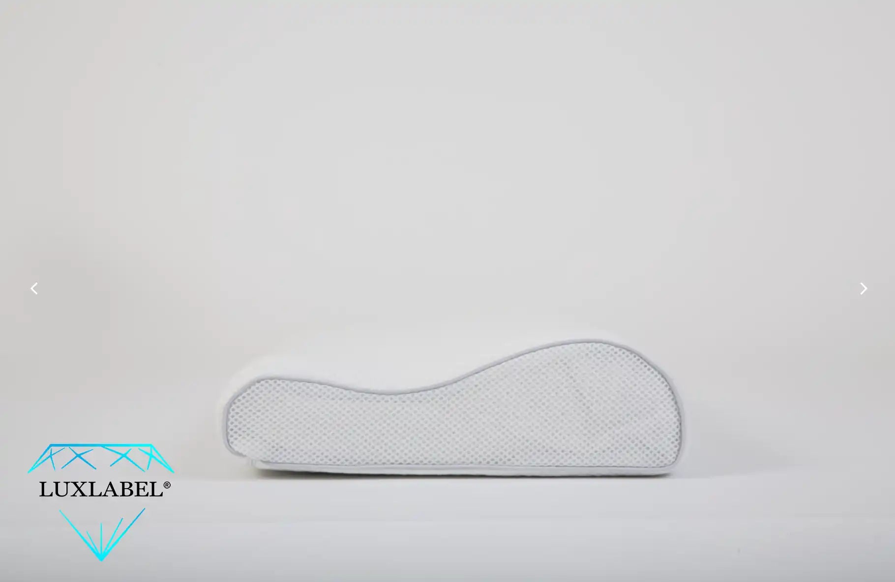 Ergonomisches graues Kissen.